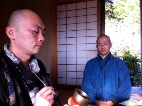 Rev. Nemoto (left) leads meditation at a death workshop at his temple