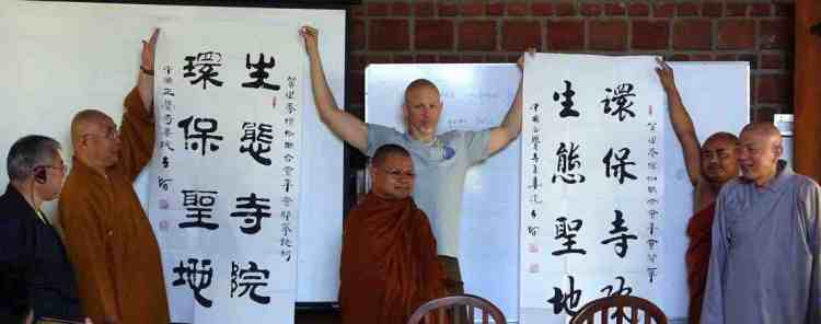 In Chinese characters: "Protecting the Sacred Land Eco-Temple". Ven. Master Ren Da (left) & Ven. Miao Hai (right) at the eco-temple meeting in Sri Lanka 2016