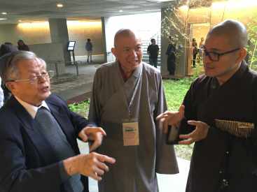 a lively discussion at the break with Prof. Chen, Ven. Miao Hai (Mainland China), and Ven. Tianwen (Hong Kong)