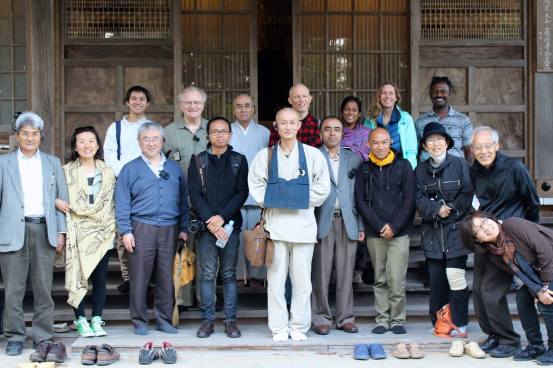 Participants at Dokei-ji Temple with Abbot Toku-un Tanaka inside the evacuation zone
