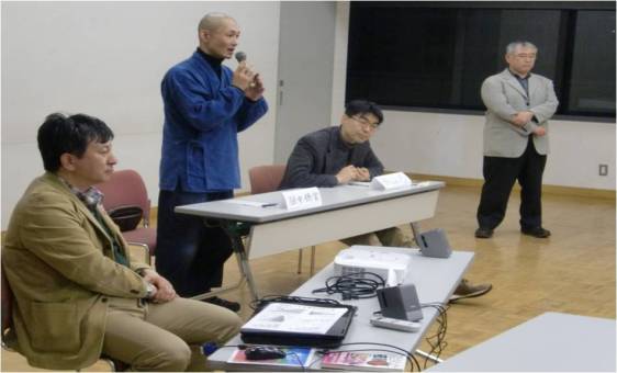 Rev. Tanaka (center) giving this talk at a meeting of the Interfaith Forum for the Review of National Nuclear Policy in Tokyo January 2012 with Forum leaders Rev. Noda (Lutheran), Rev. Okayama (Jodo Shin) and Rev. Okochi (Jodo).